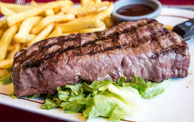 juicy steak beef meat with tomato and french fries