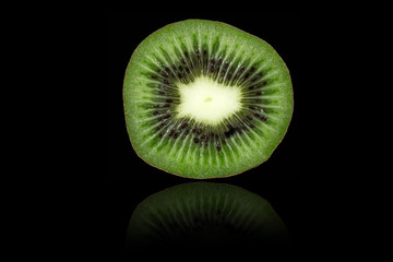 kiwi with reflection on black background