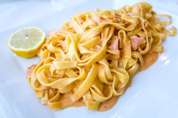 pasta with salmon on a the table