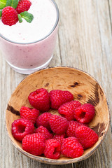 Raspberry milk shake with mint decor.