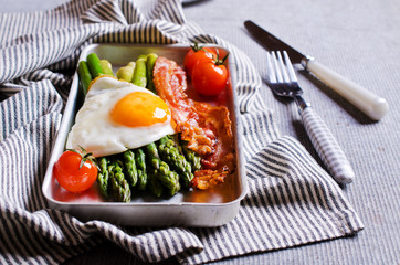 Green asparagus with fried eggs
