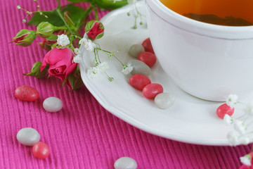 Cup of tea and roses