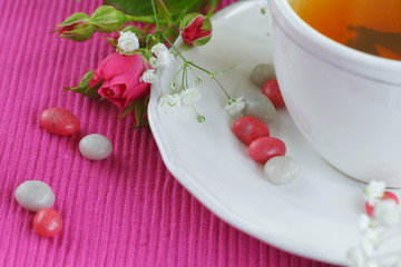 Cup of tea and roses