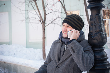 European man talking on the phone