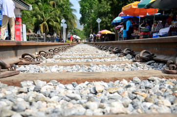 Market fair beside Railway train go to Bridge over the River Kwa