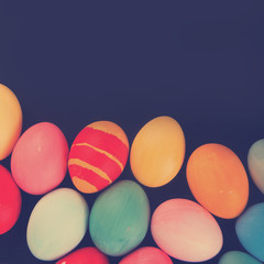 Fototapeta na wymiar colorful Easter eggs on a black background