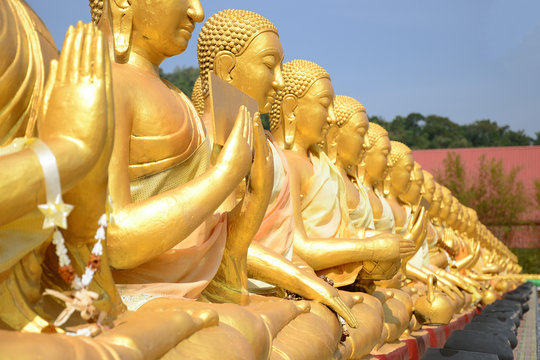 Close up of Thousand Golden Buddha statues