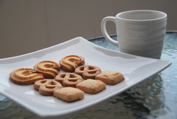 Delicious butter biscuits with coffee