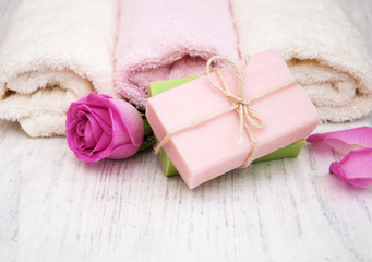Bath towels and soap with pink roses