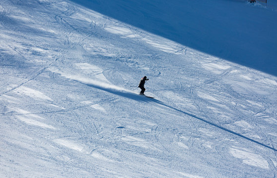 Skiers sliding from mountains