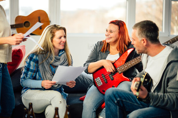 Home band learning new song together