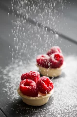 Deurstickers delicious dessert tarts with fresh raspberries © Ruslan Mitin