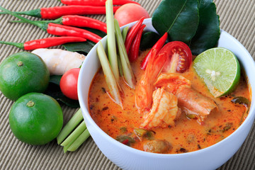Thai Prawn Soup with Lemongrass (Tom Yum Goong) on Brown Cloth Background.