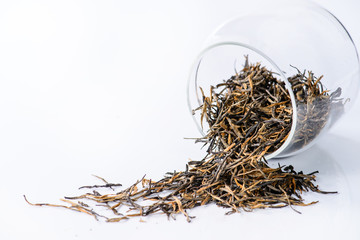 close-up of spilled tea Golden needle with a red-haired (Golden