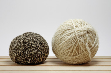 Natural wool ball isolated on white background, studio shot.