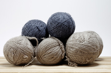 Fototapeta na wymiar Natural wool ball isolated on white background, studio shot.