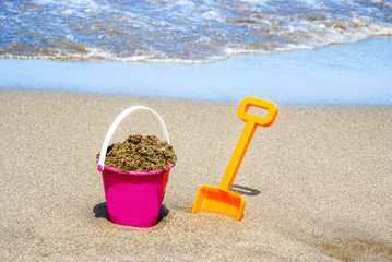 Fototapeta na wymiar Bucket and spade for the beach