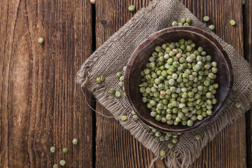 Obraz na płótnie Canvas Heap of dried green Peas