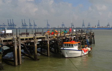 Fototapeta na wymiar Harwich Quay, Port of Felixstowe in the Background Largest Container Port in Europe.
