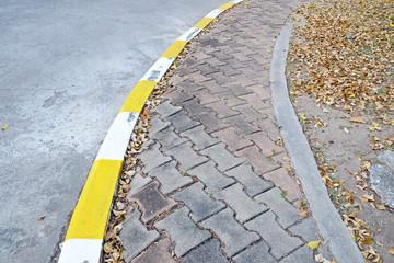 Fototapeta premium footpath pavement sidewalk with traffic sign