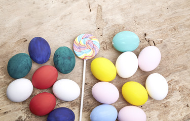 Fototapeta na wymiar multicolored lollipops and easter egg