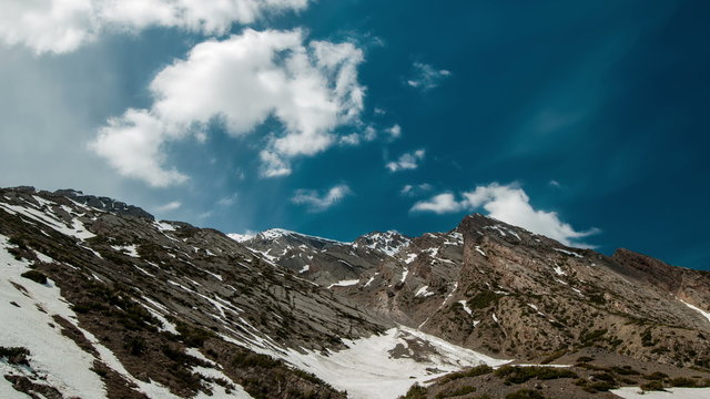 4K Timelapse. Clouds over the mountain tops Sairam-Su, Tyan-Shan