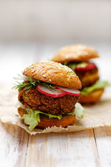 Falafel burger on a wooden rustic table