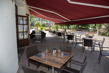 Restaurant exterior design with tables and chairs