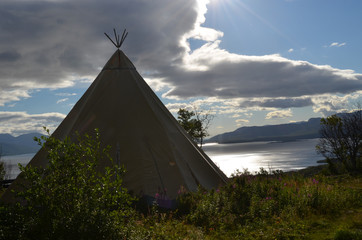 Wigwam in a meadow in subarctic valley, Bjorkliden, Swedish Lapland © lembrechtsjonas