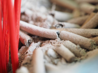 Joss sticks incense ash closeup
