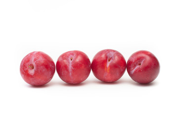 Four red plums