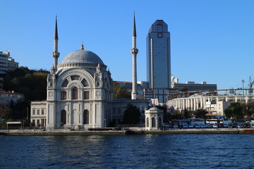 Fototapeta na wymiar Dolmabahçe Mosque as seen from the Bosporus, Istanbul, Turkey