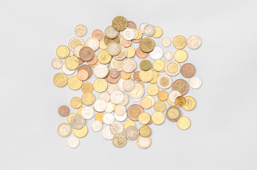 Money and Finance Topic: cash coins are isolated on a white background in the studio a top view