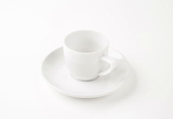 White cup and saucer