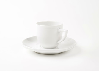 White cup and saucer