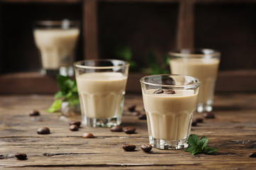 Cold cream with coffe and mint on the wooden table