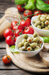 Spanish olives on the wooden table
