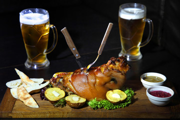 Pork knuckle baked in the oven - Stock Image
