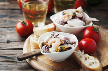 Seafood salad with white wine