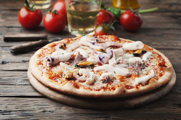 Italian traditional pizza with seafood