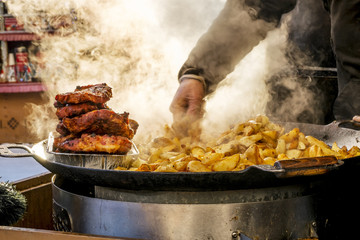 Street grill in the town hall square in Tallinn. Estonia.