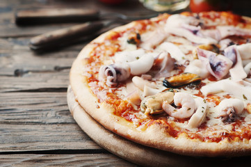 Italian traditional pizza with seafood