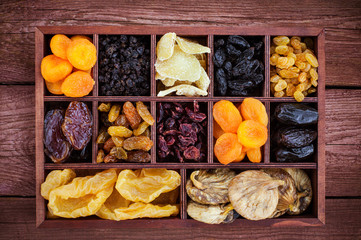 Assorted  dried fruits in wooden box
