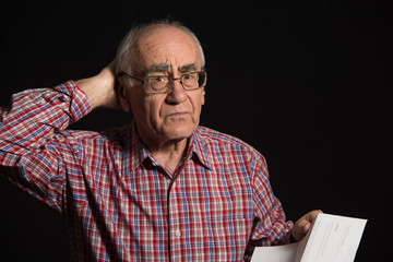 old man with bank document