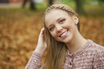 Portrait close up of young beautiful blonde girl