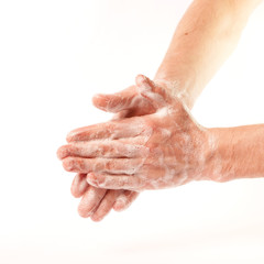 Fototapeta premium Hands in the foam