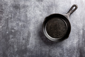 cast iron pan on dark background