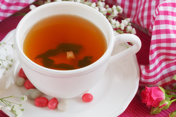 Cup of tea and roses