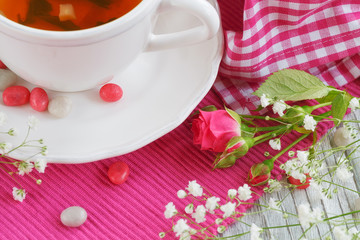 Cup of tea and roses
