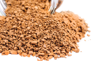 Sublimated coffee poured out from glass jars